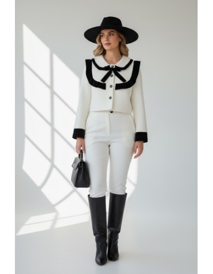 Veste chic blanche à col contrasté noir